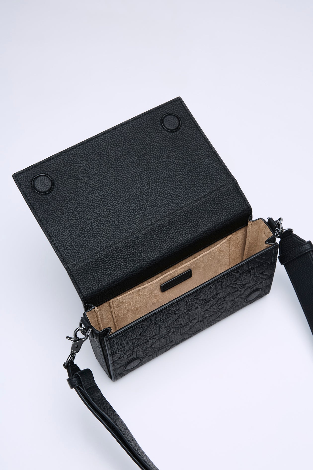 MONOGRAM EMBOSSED CROSSBODY