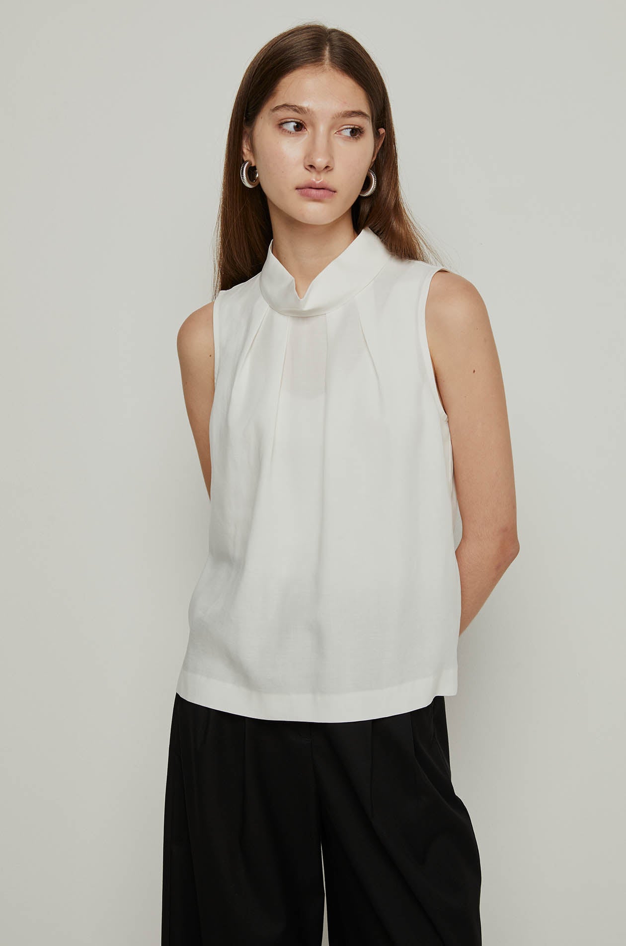 PLEATED MOCK NECK BLOUSE