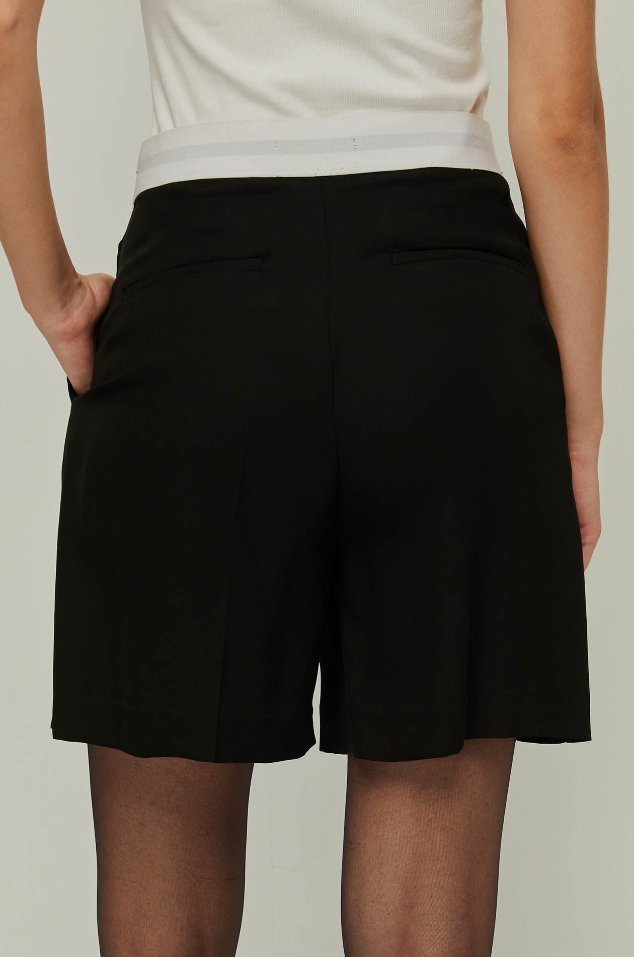 PLEATED LOGO WAIST MINI SKIRT