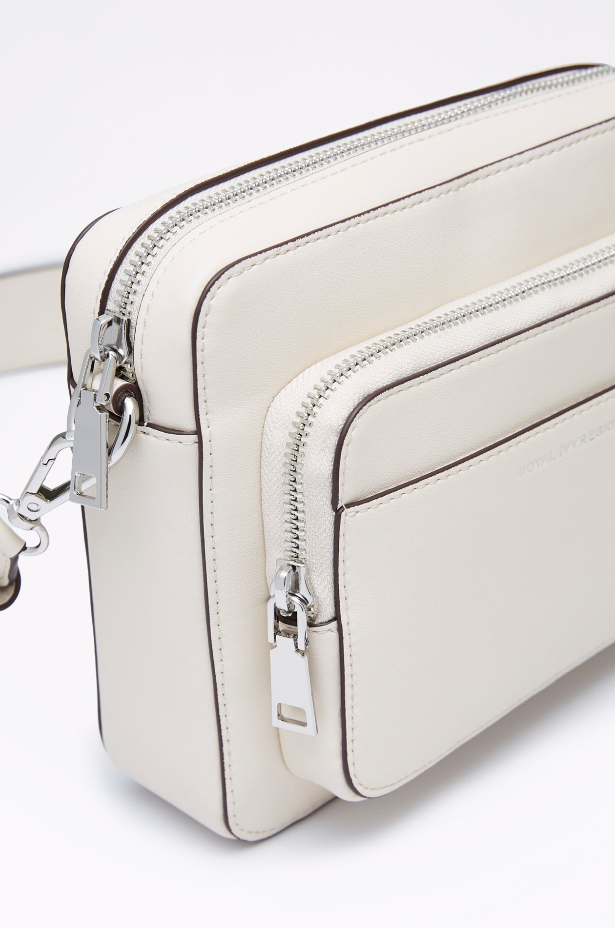 DEBOSSED LOGO ZIPPER CROSSBODY BAG