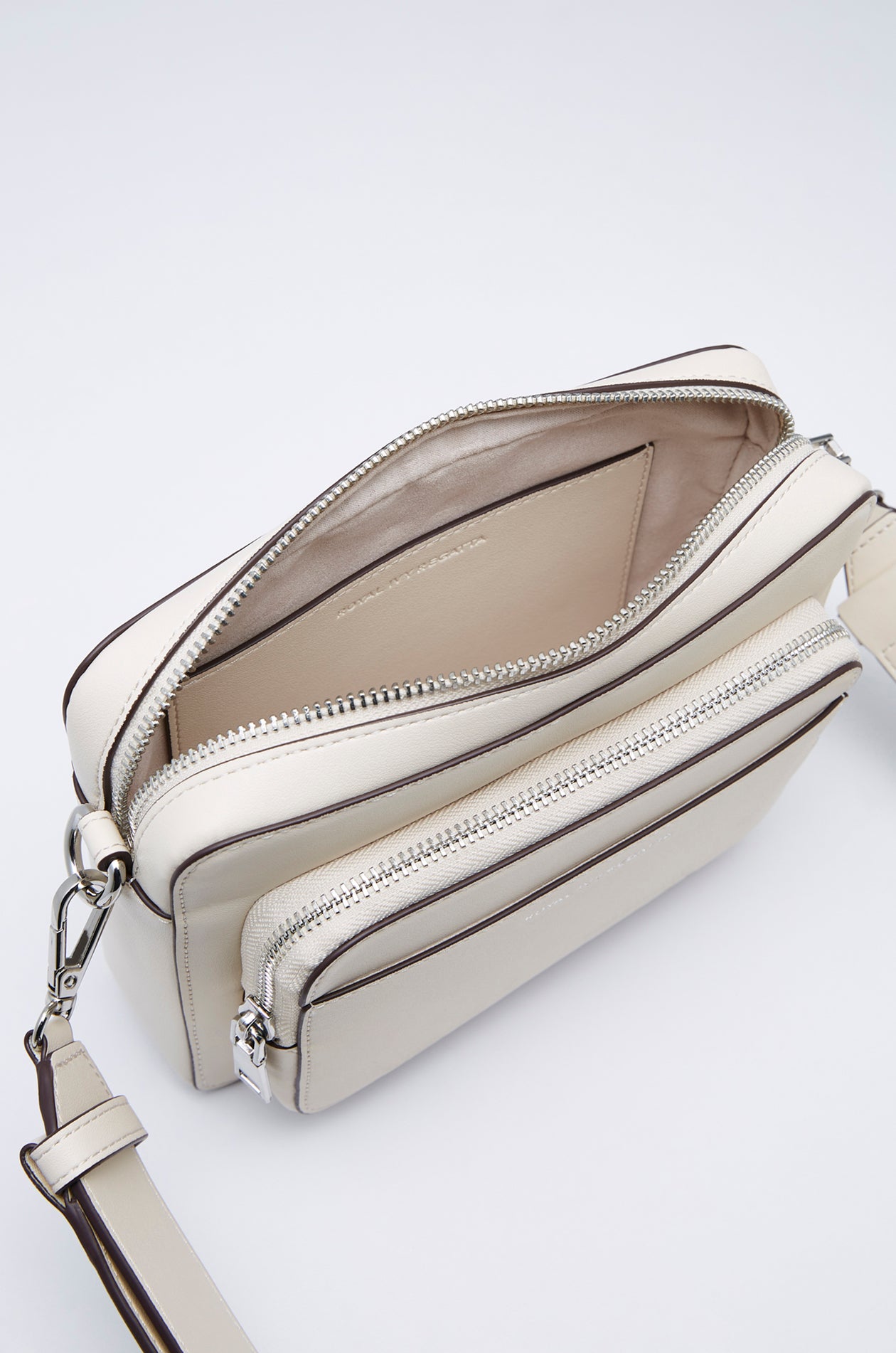 DEBOSSED LOGO ZIPPER CROSSBODY BAG