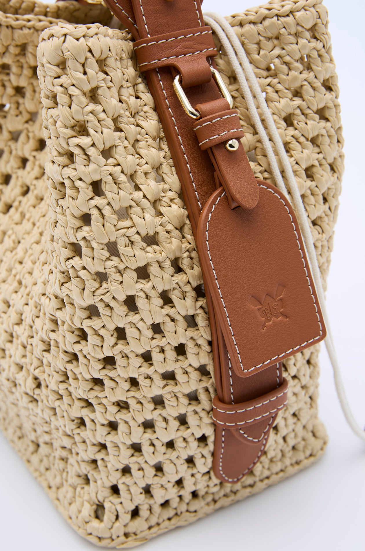 RAFFIA BUCKET BAG