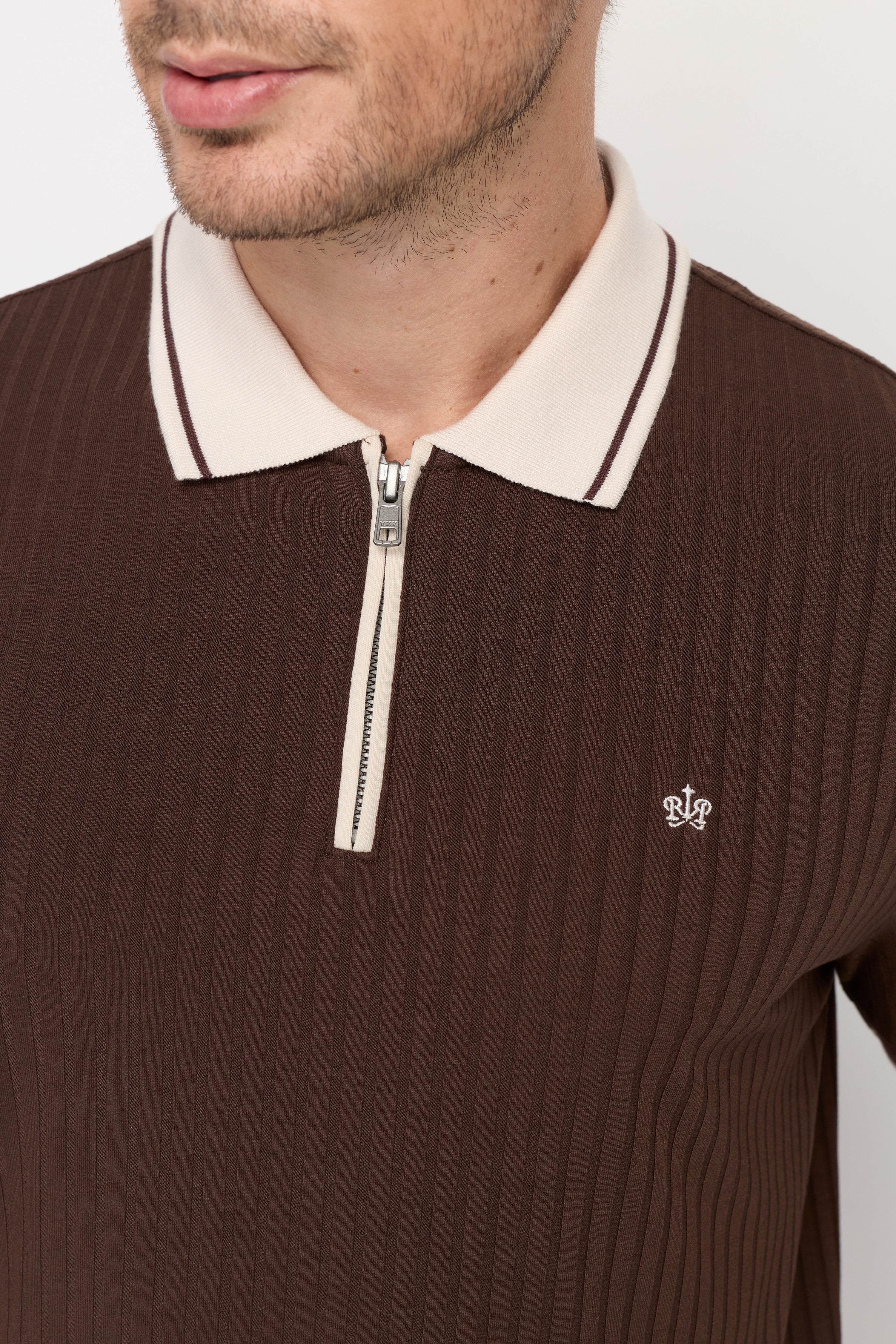 HERITAGE RIBBED ZIP POLO