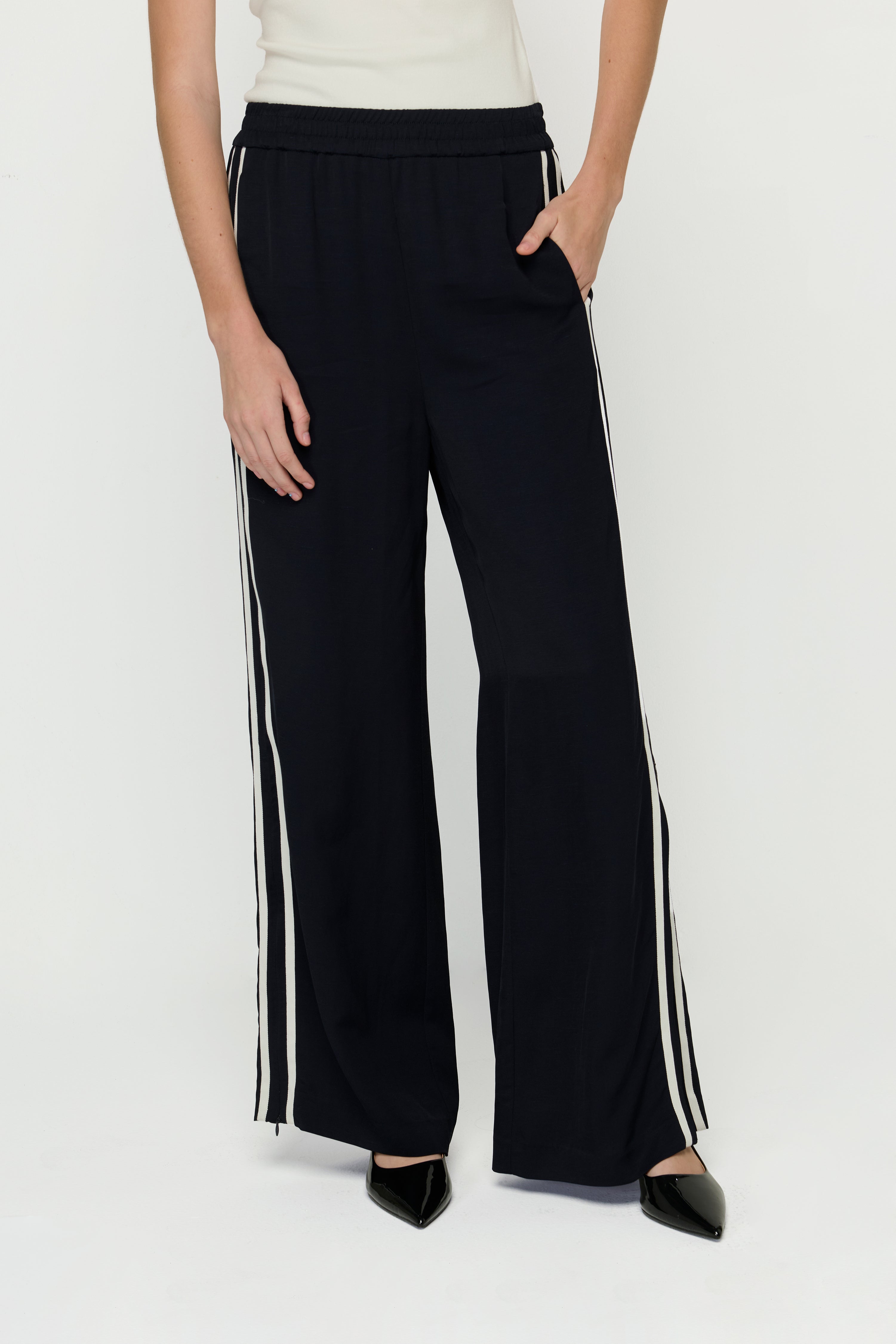 FLARED HEM SLIT PANTS