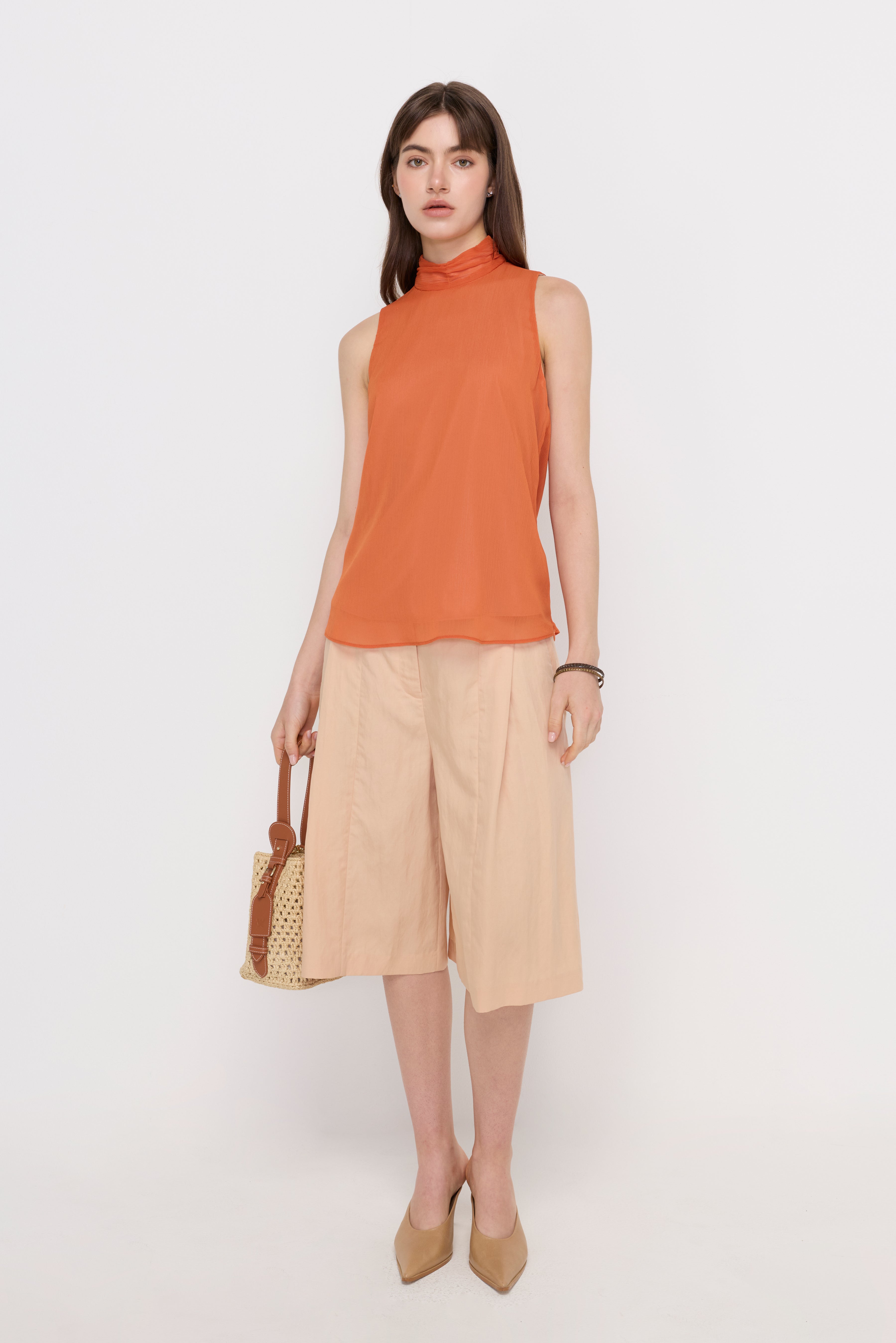 SHEER HIGH-NECK SLEEVELESS BLOUSE