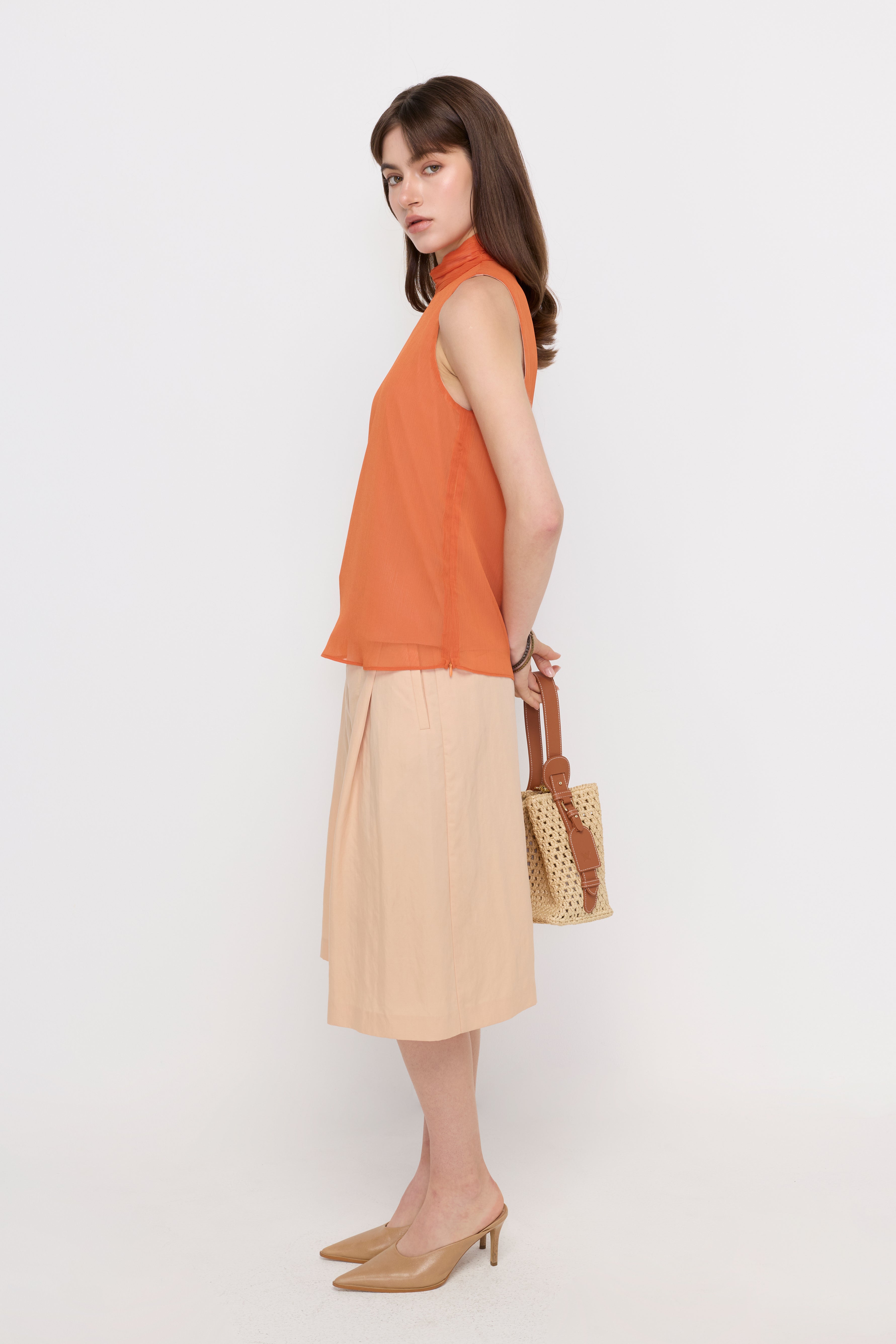 SHEER HIGH-NECK SLEEVELESS BLOUSE