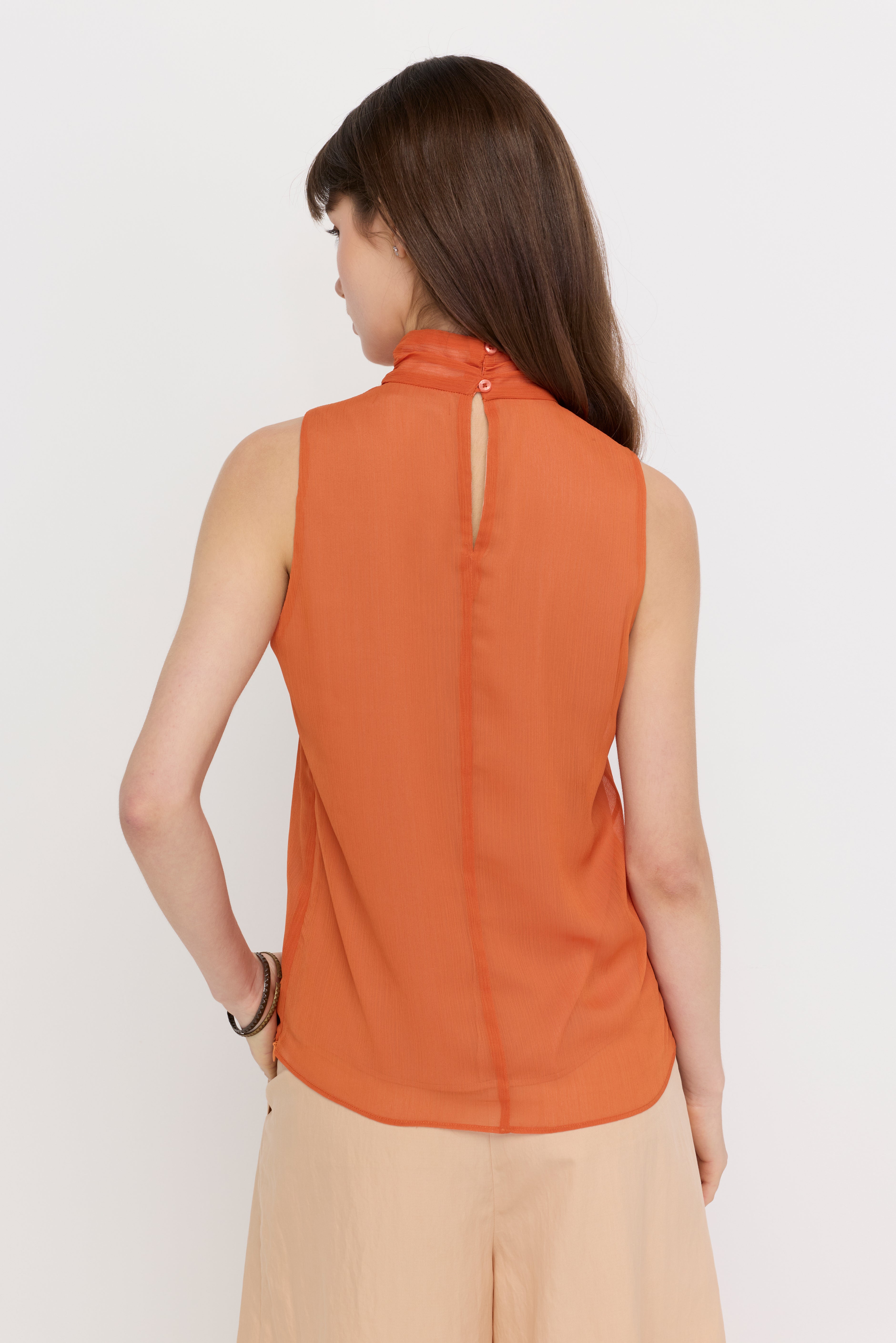 SHEER HIGH-NECK SLEEVELESS BLOUSE