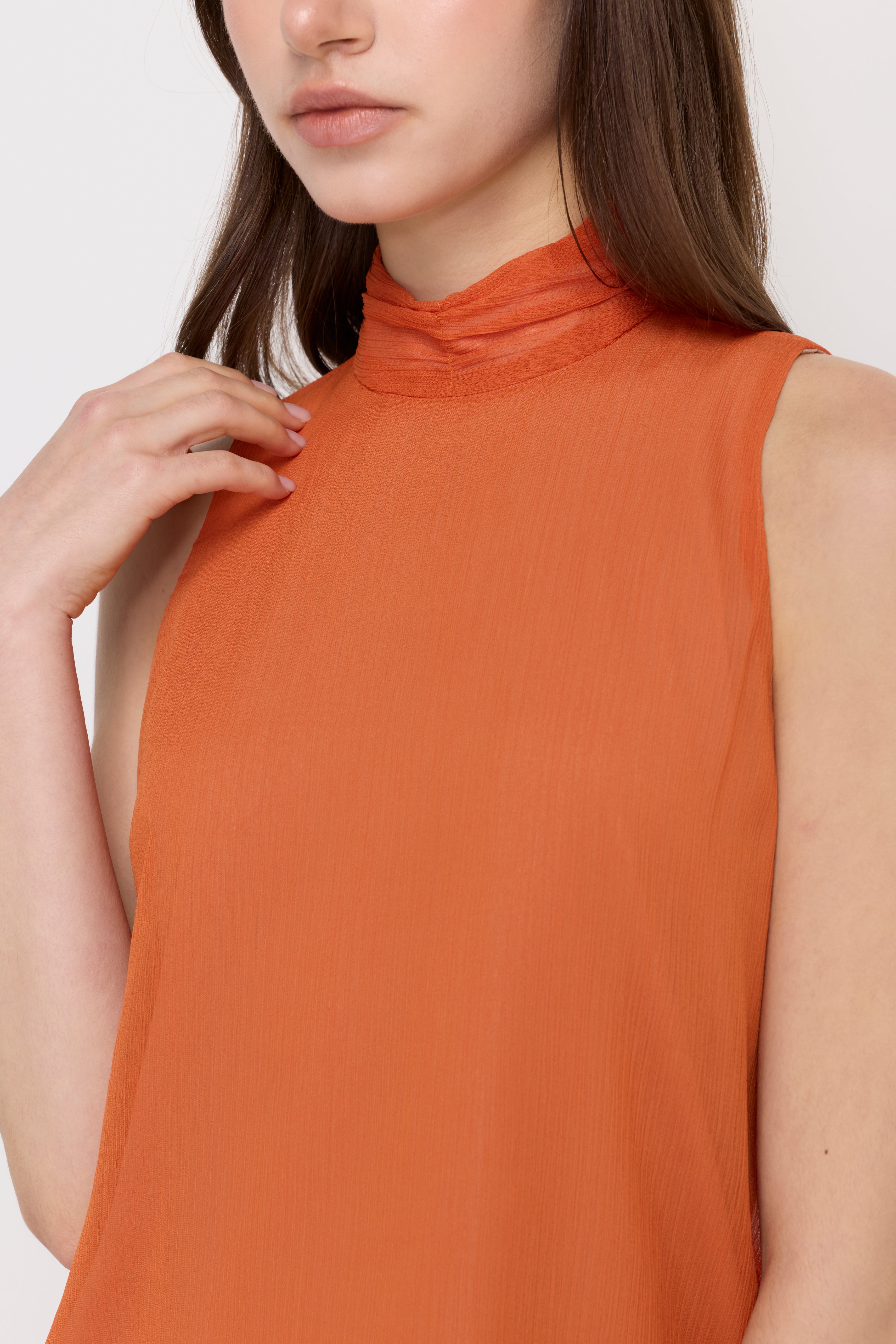 SHEER HIGH-NECK SLEEVELESS BLOUSE