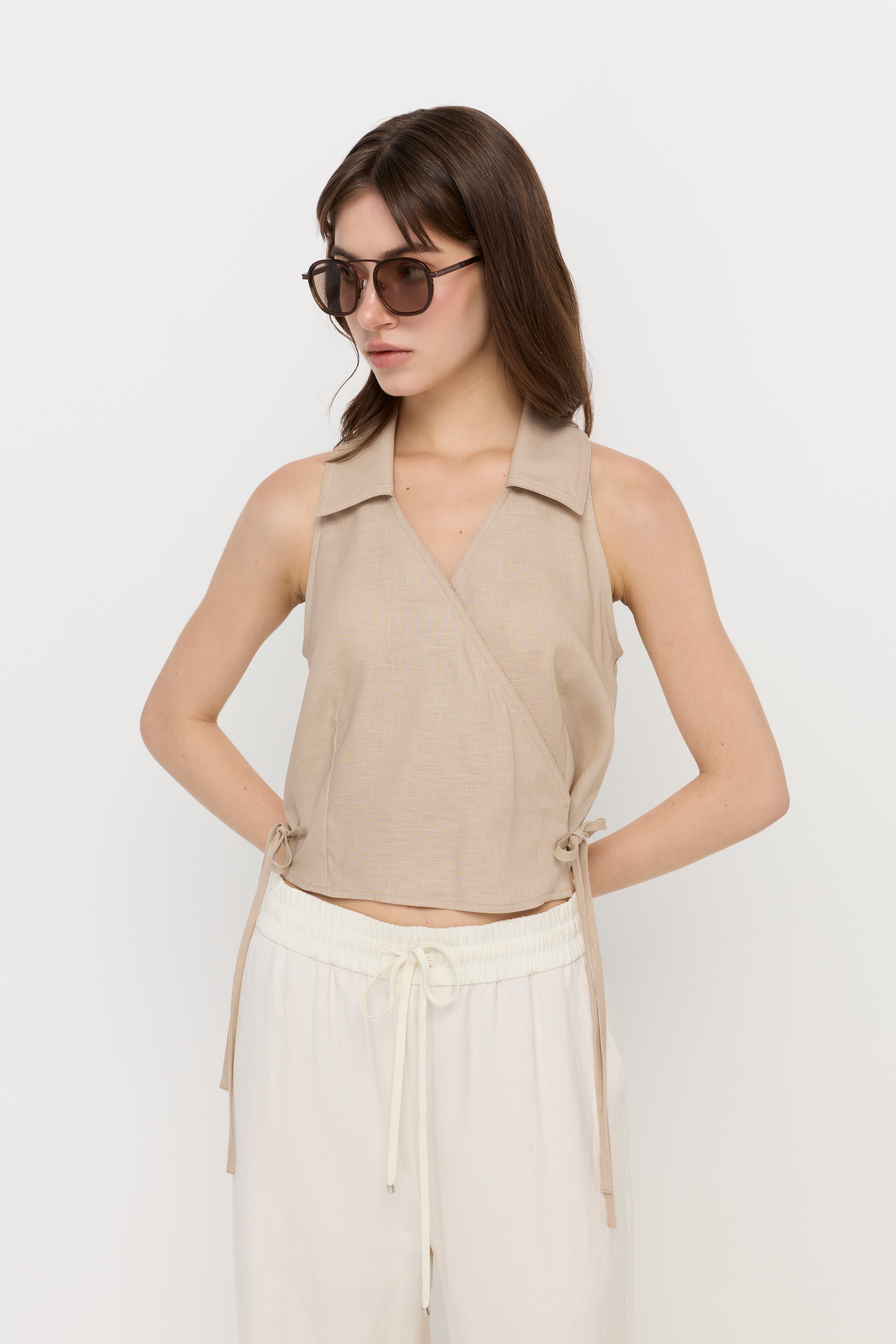 SLEEVELESS COLLARED WRAP TIE TOP