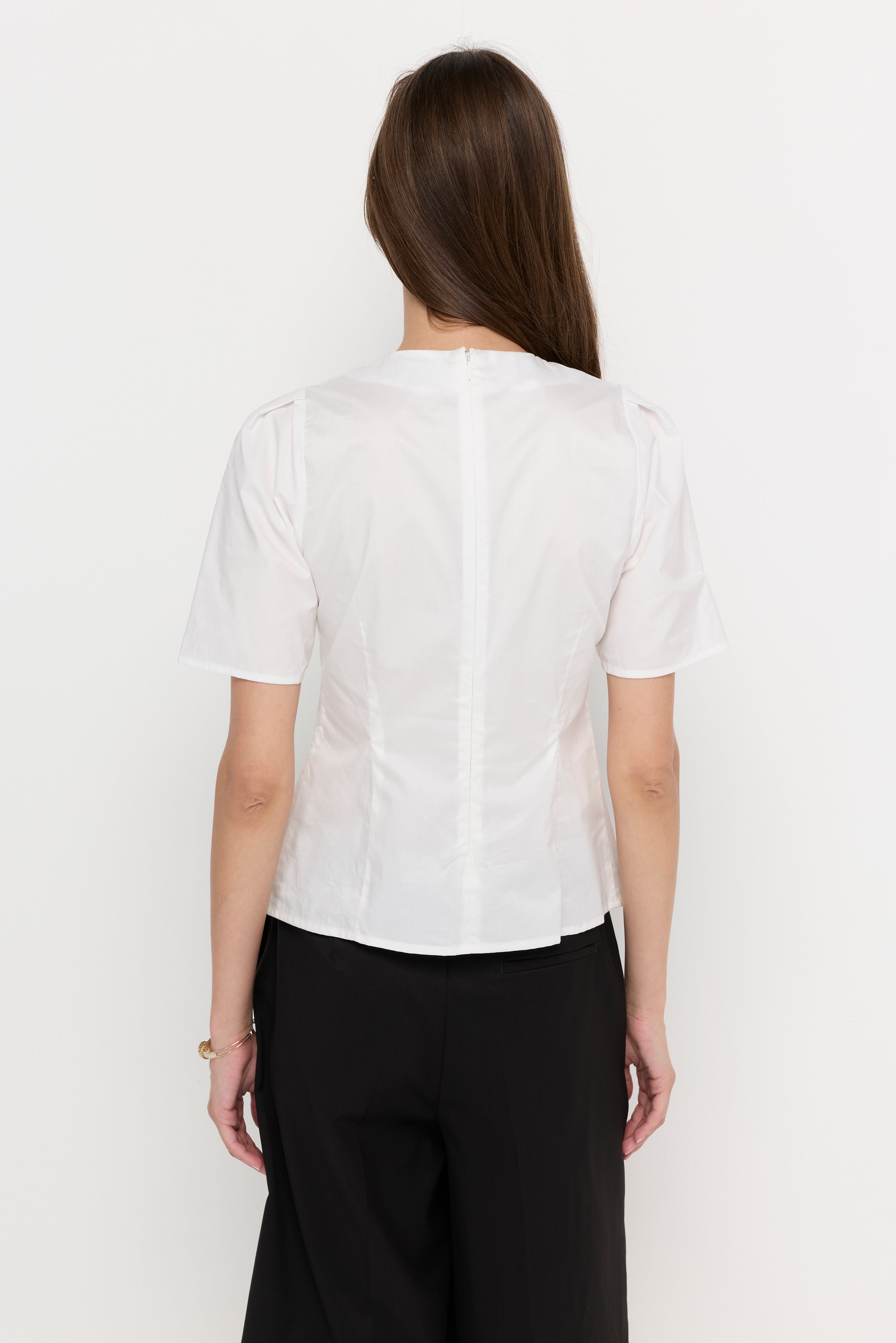 PLEATED FRONT PEPLUM BLOUSE
