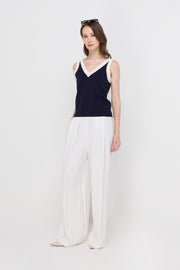 HIGH-WAIST PLEATED WIDE-LEG TROUSERS