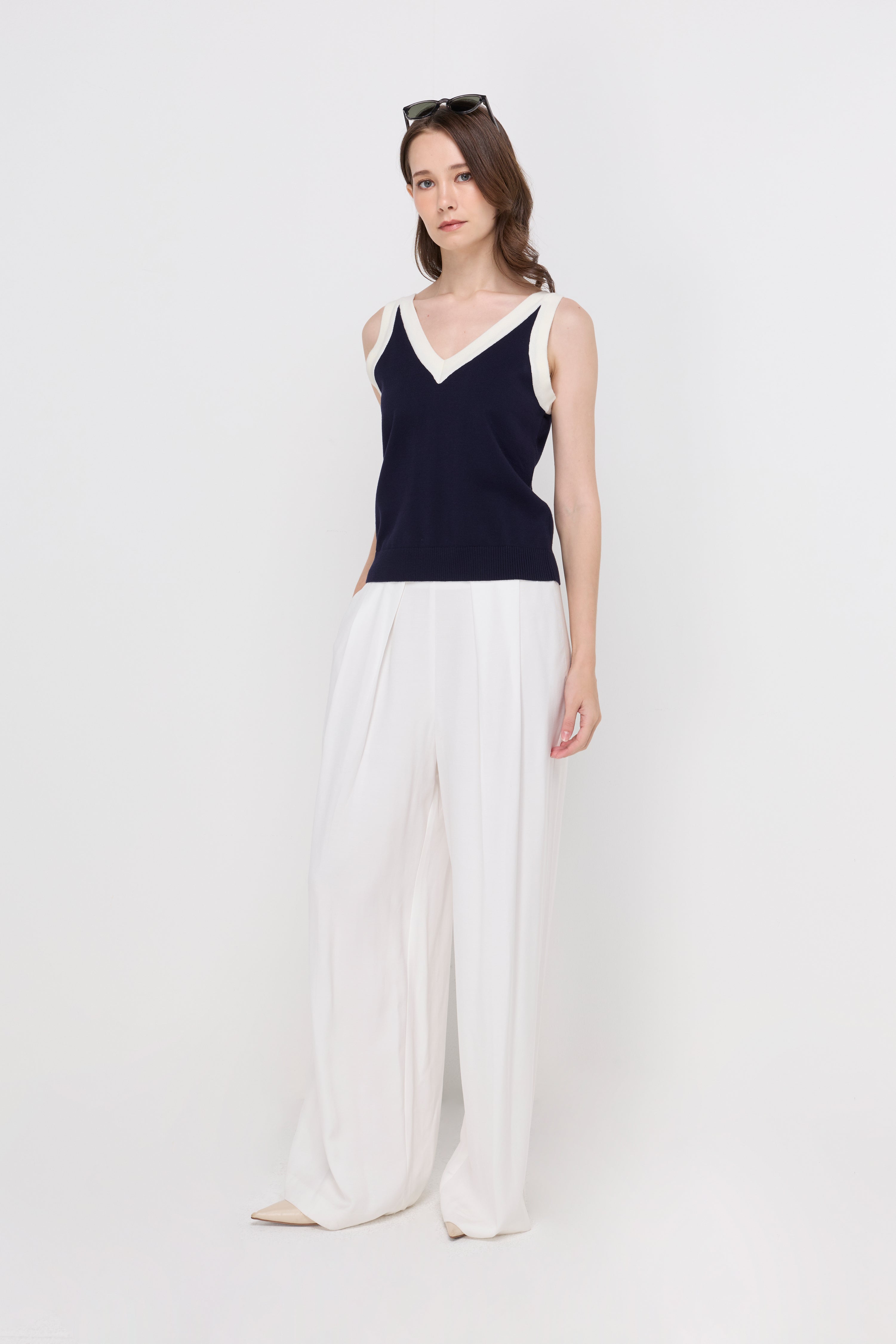 HIGH-WAIST PLEATED WIDE-LEG TROUSERS