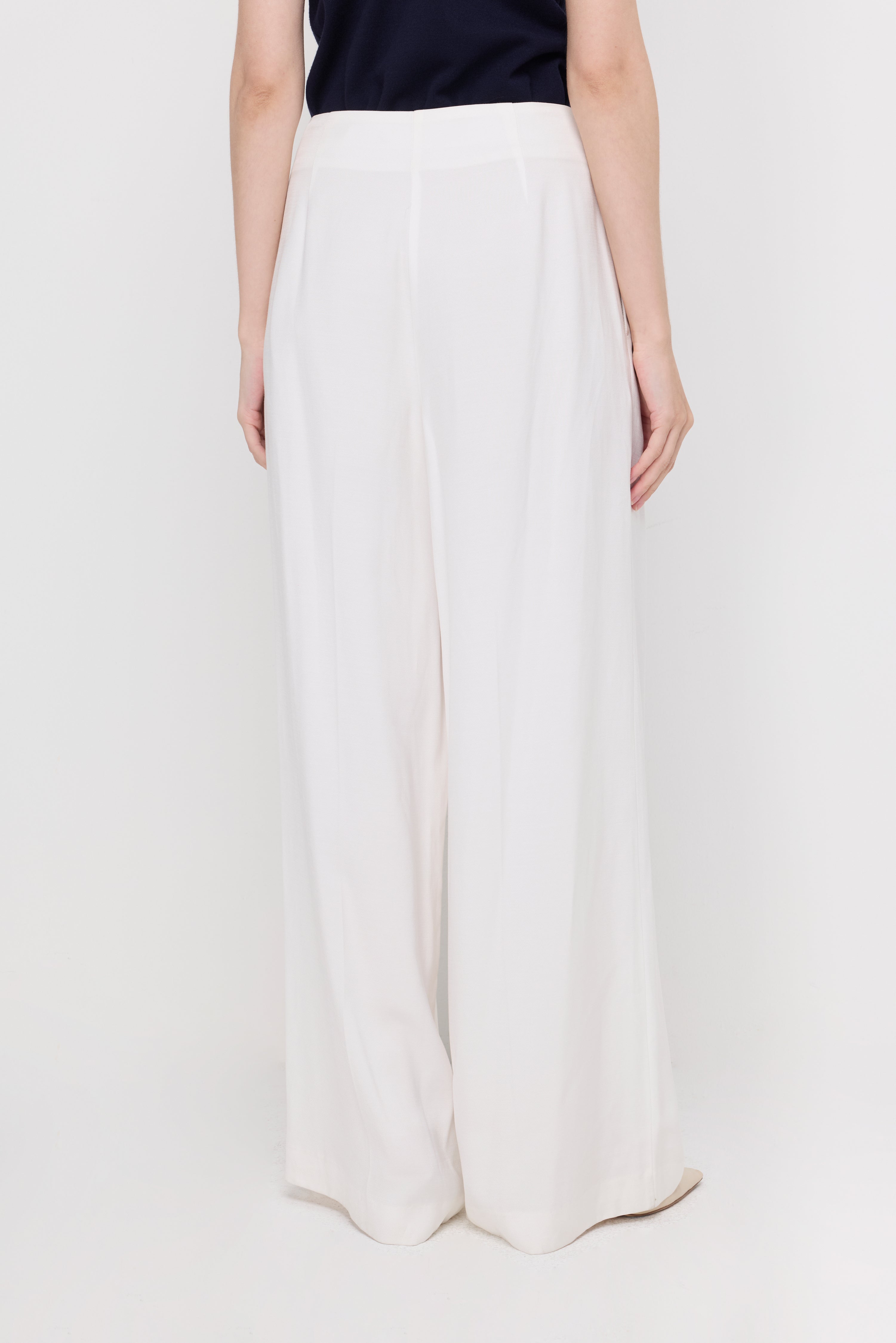 HIGH-WAIST PLEATED WIDE-LEG TROUSERS