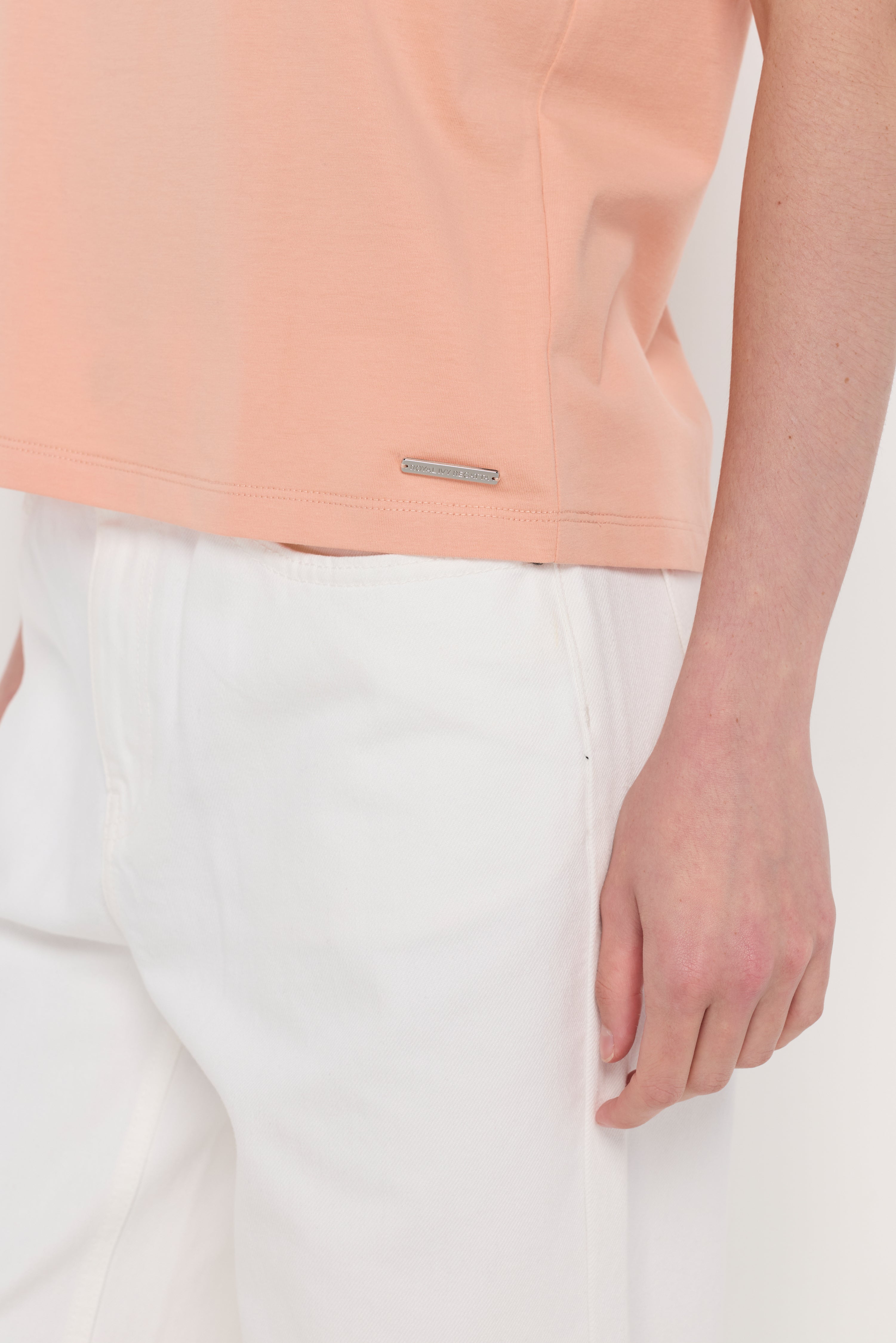 ESSENTIAL SLEEVELESS KNIT TOP