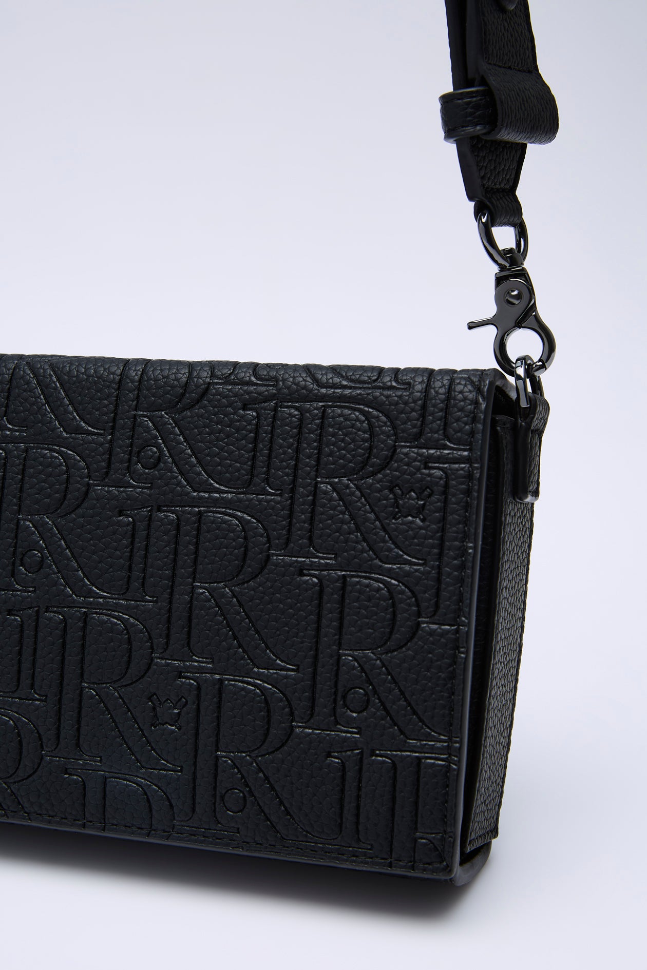MONOGRAM EMBOSSED CROSSBODY
