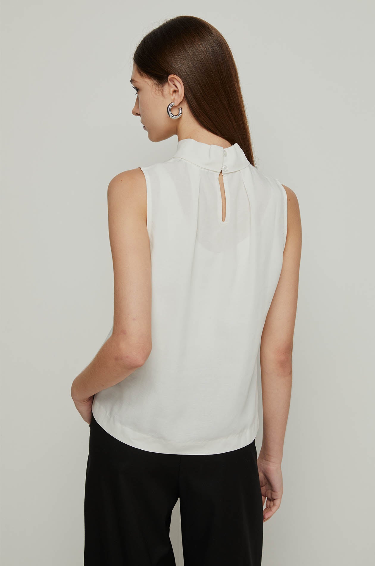 PLEATED MOCK NECK BLOUSE