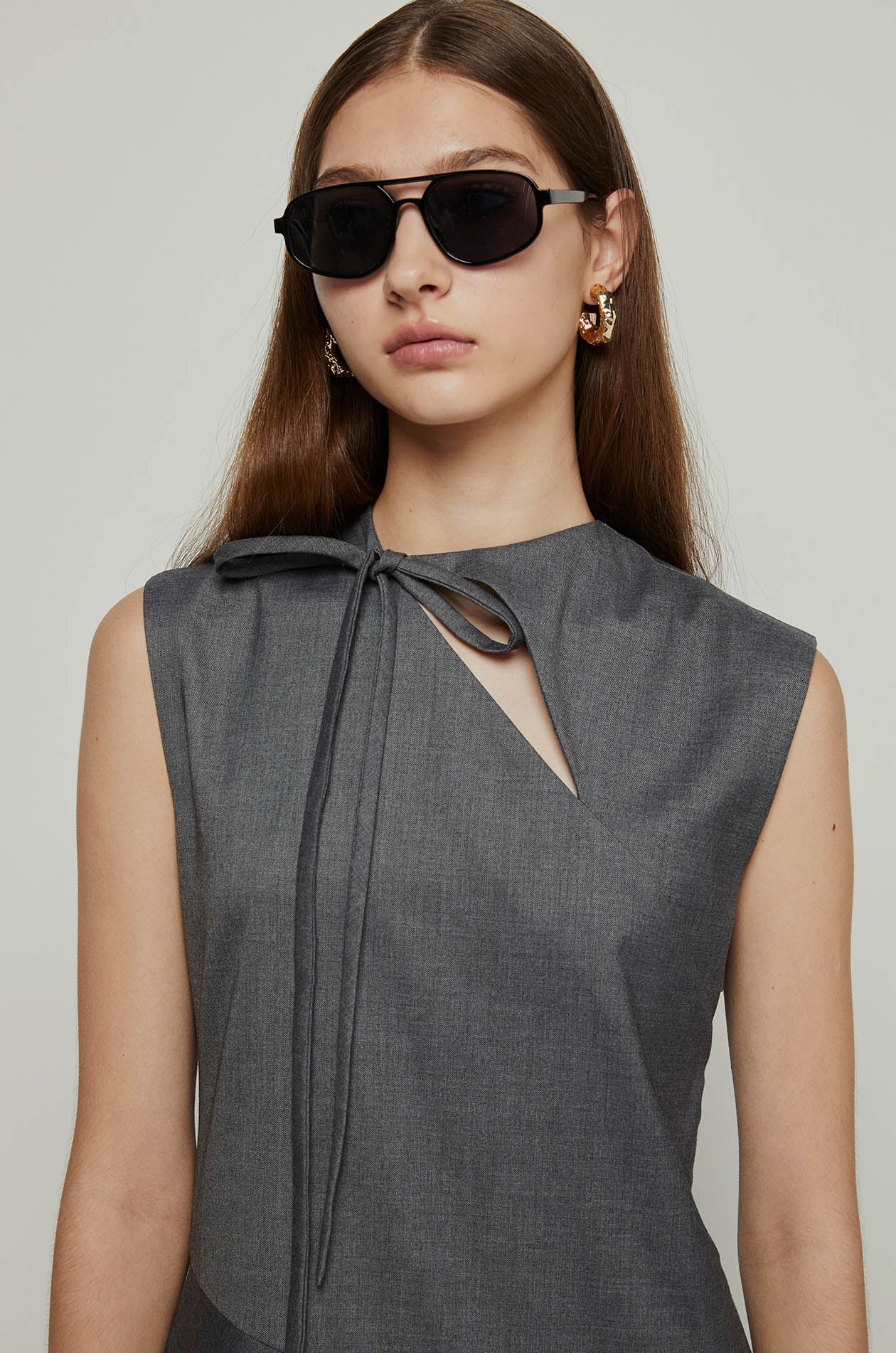 SLEEVELESS FLARED DRESS