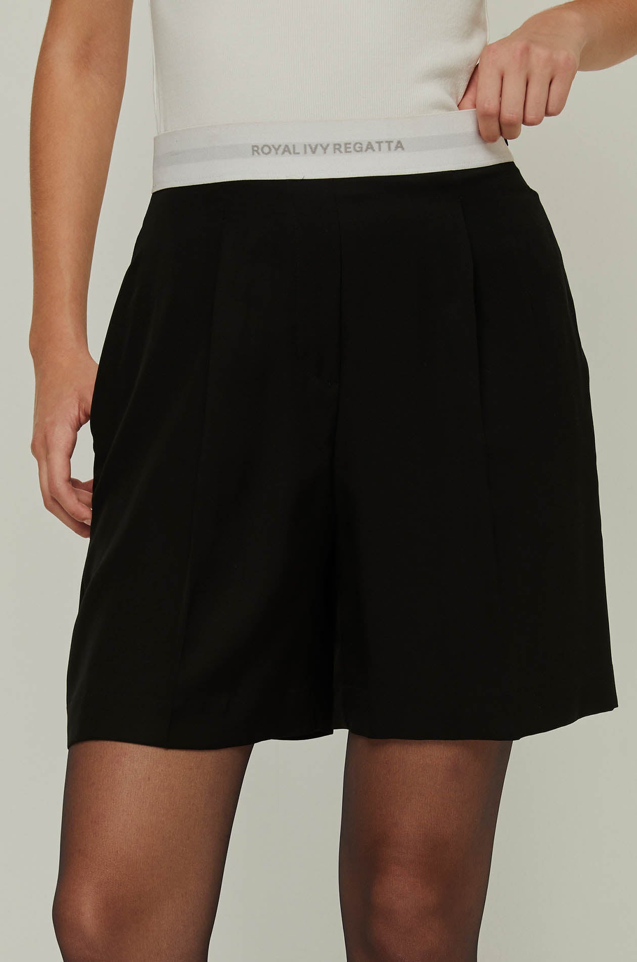 PLEATED LOGO WAIST MINI SKIRT